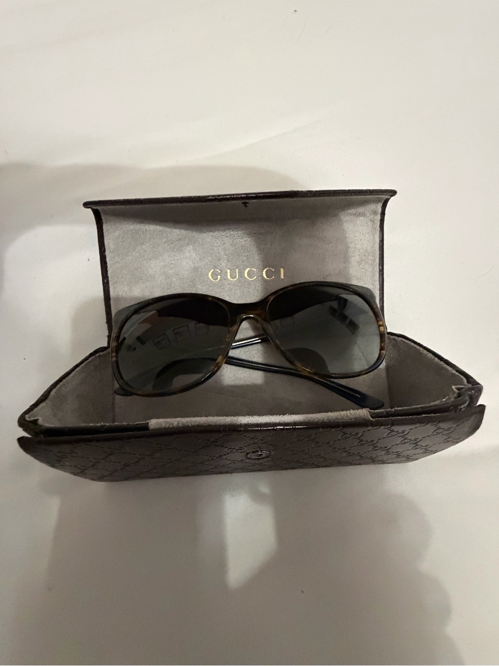 Gucci Women’s Tortoiseshell Sunglasses with Dark Lenses